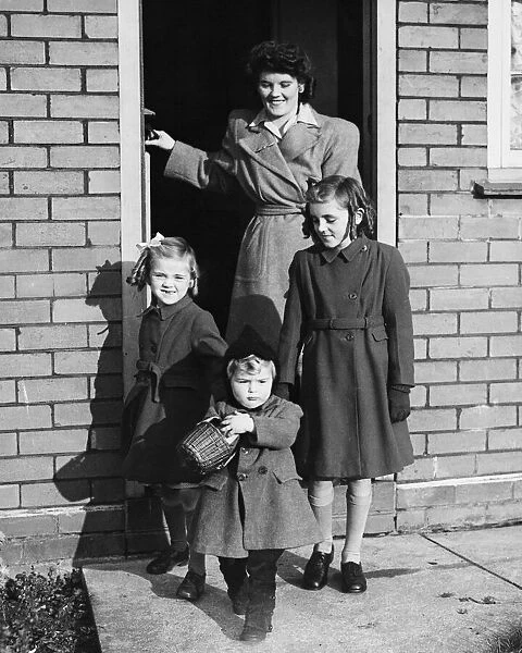 Miss Edna Ford with daughters and baby Roger during the Second World War