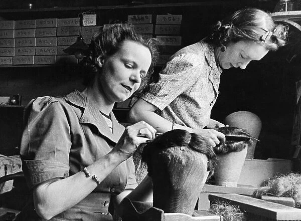 Miss Gladys Harrison and Mrs. Winterburn in their studio near Oxford Street