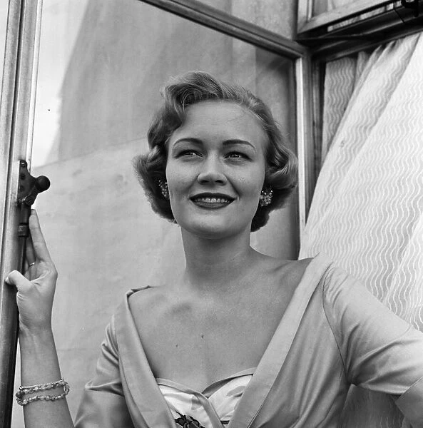 Miss Helen Landon, the American Maid of Cotton for 1957, at the Westbury Hotel