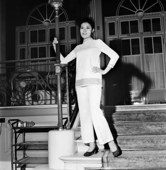 Framed Print : Miss Japan, Emiko Karashima (20) from Tokyo Japan, dons a trouser suit instead of her Framed Print : Miss Japan, Emiko Karashima (20) from Tokyo Japan, dons a trouser suit instead of her