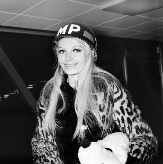 Framed Print : Miss World, Eva Rueber-Staier wearing the U. S. helmet pictured at Heathrow