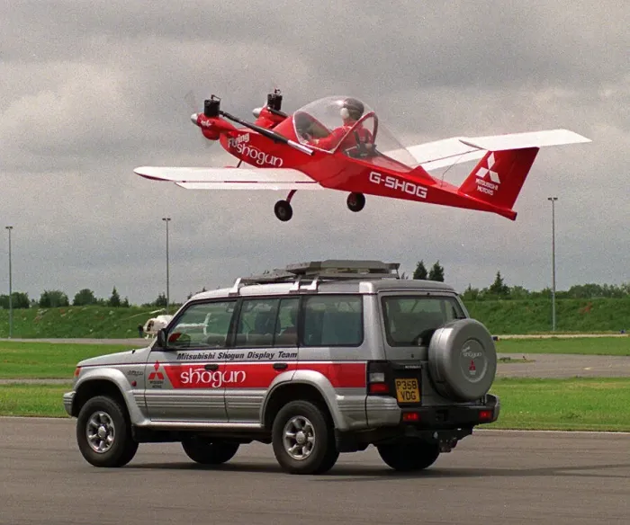 Framed Print : The Mitsubishi flying Shogun display team, in which a twin Cri Cri powered by motor mower Framed Print : The Mitsubishi flying Shogun display team, in which a twin Cri Cri powered by motor mower