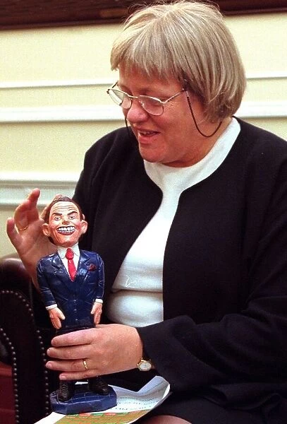 Mo Mowlam MP is delighted by the carved caricature December 1997 of Tony Blair by