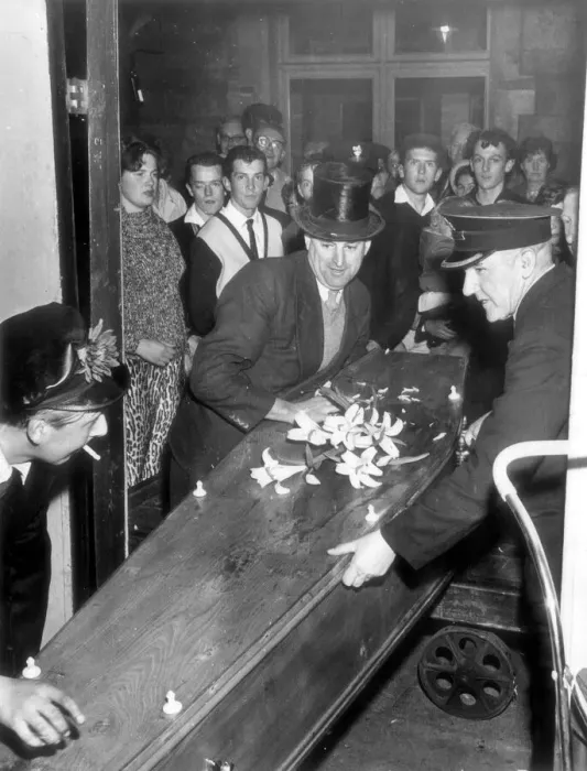 Framed Print : A mock funeral, complete with coffin, for the last passenger train on the Wells to