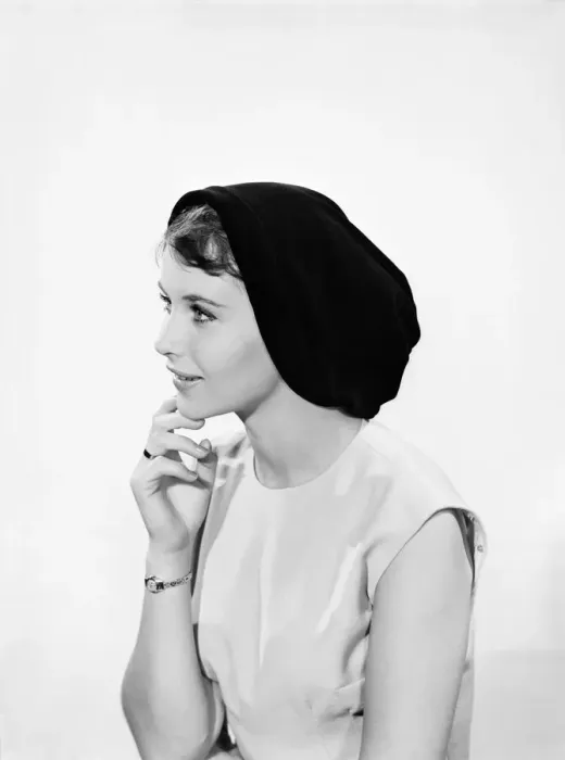 Framed Print : Model Ann Cave wearing a collection of spring and summer hats. Circa 1962