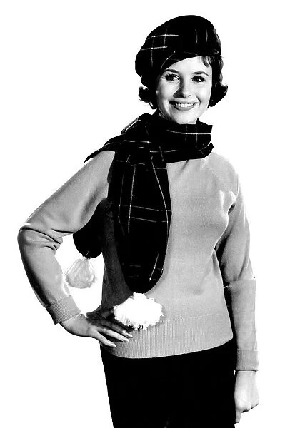 Model Ann Cave wearing scarf and matching hat. February 1962