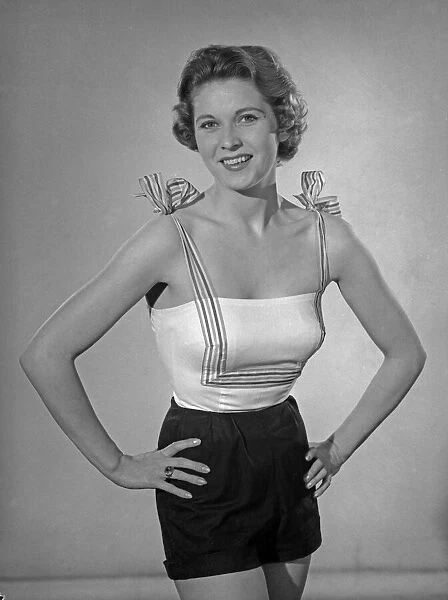 Model Betty Leslie seen here wearing a Bow Top made from a Reveille readers pattern