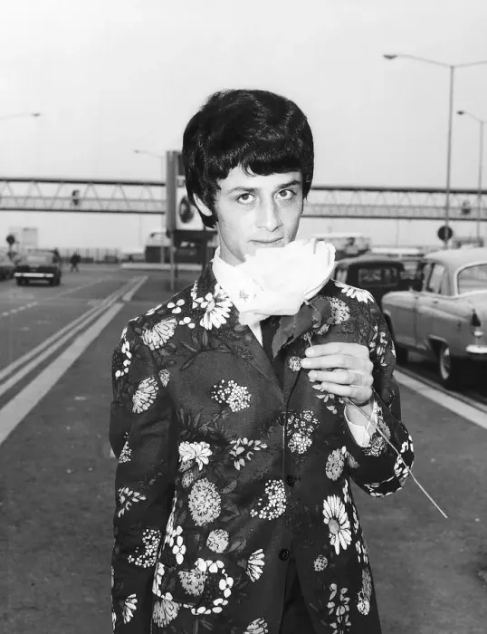 Framed Print : Model Conrad Cockburn, August 1967 One of the flower men leaving Heathrow Airport