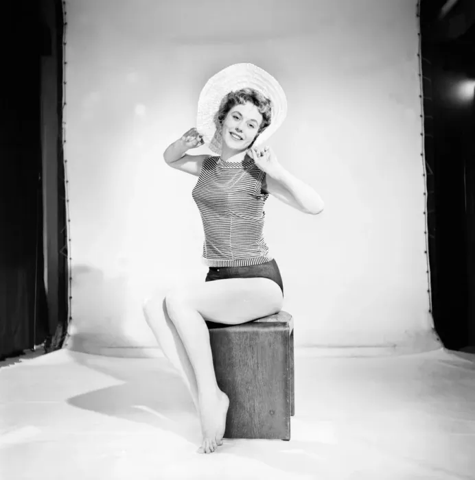 Framed Print : Model Darien Leigh seen here modelling the latest hat fashions. 1965