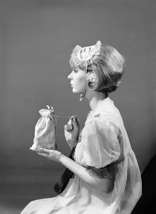 Framed Print : Model Dawn Chapman wearing face mask to aid her in getting a good nights sleep. 1962