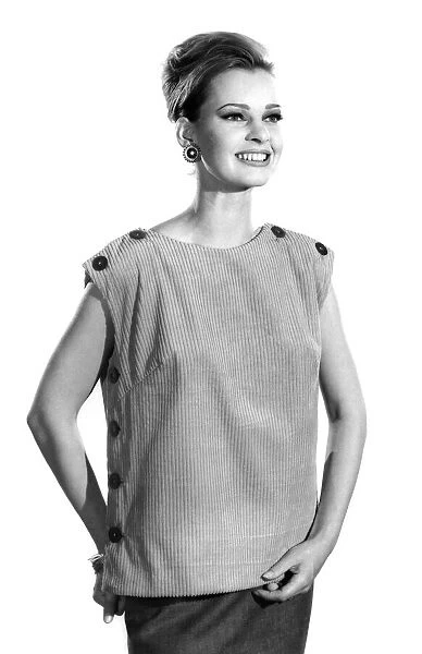 Model Dawn Chapman wearing a sleeveless top. December 1962 P008841