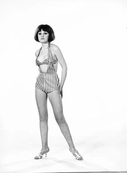 Model, Debbie Attwood, poses in the latest beachwear fashion, Studio Pix, 1963