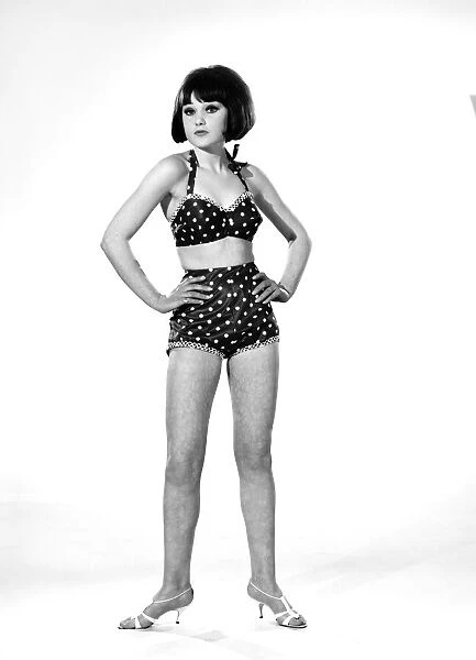 Model, Debbie Attwood, poses in the latest beachwear fashion, Studio Pix, 1963