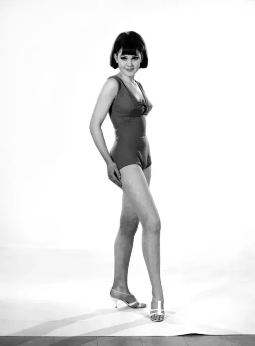 Framed Print : Model, Debbie Attwood, poses in the latest beachwear fashion, Studio Pix, 1963 Framed Print : Model, Debbie Attwood, poses in the latest beachwear fashion, Studio Pix, 1963