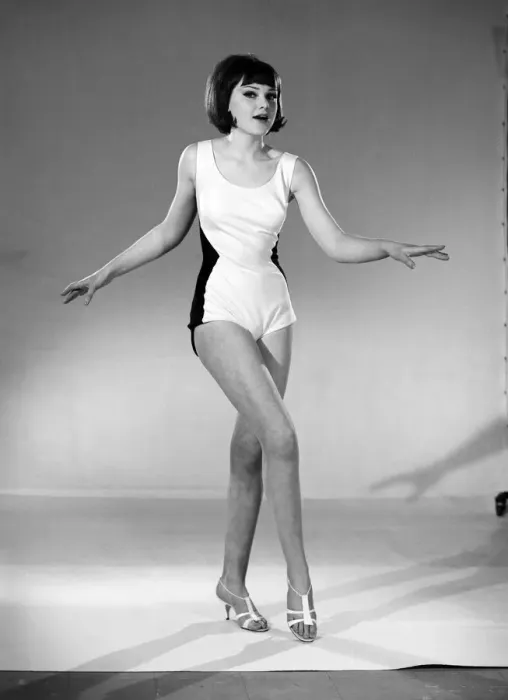 Framed Print : Model, Debbie Attwood, poses in the latest beachwear fashion, Studio Pix, 1963 Framed Print : Model, Debbie Attwood, poses in the latest beachwear fashion, Studio Pix, 1963