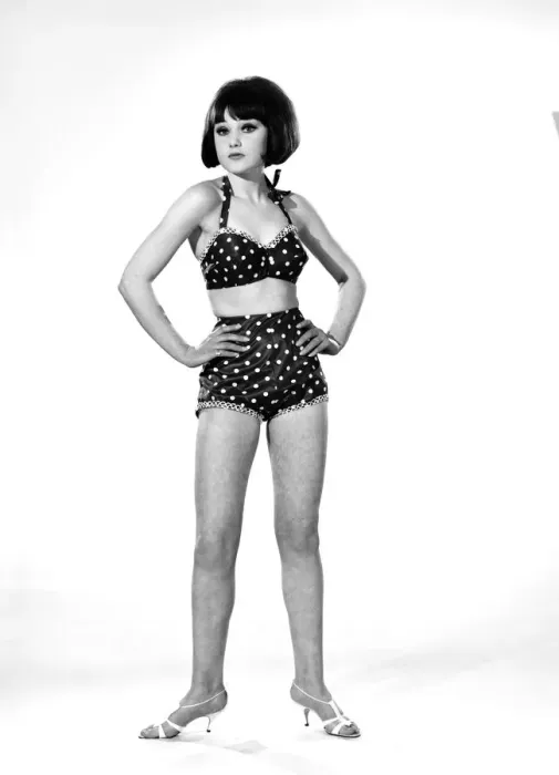 Framed Print : Model, Debbie Attwood, poses in the latest beachwear fashion, Studio Pix, 1963 Framed Print : Model, Debbie Attwood, poses in the latest beachwear fashion, Studio Pix, 1963