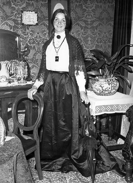 A model dressed in a victorian outfit