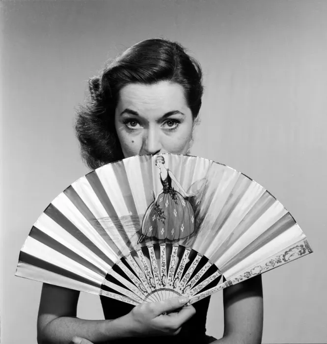 Framed Print : Model with fan in strapless dress. Circa 1964 Framed Print : Model with fan in strapless dress. Circa 1964
