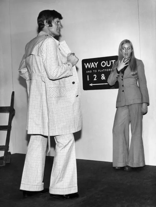 Framed Print : Model girl Jo Dickinson gets a close-up of the trendy way-out fashion for men