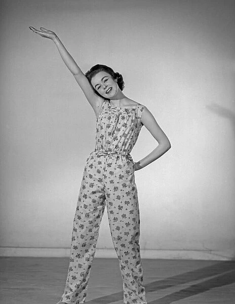 Model Jackie Jackson seen here wearing Pinafore pyjamas made from a Reveille readers