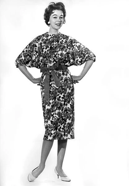 Model Jackie Jackson wearing floral patterned dress. September 1960 P008949