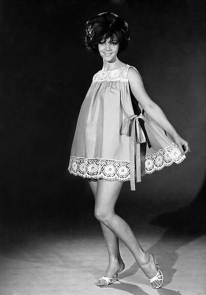 Model Jo-Ann Asher wearing a night dress. July 1965