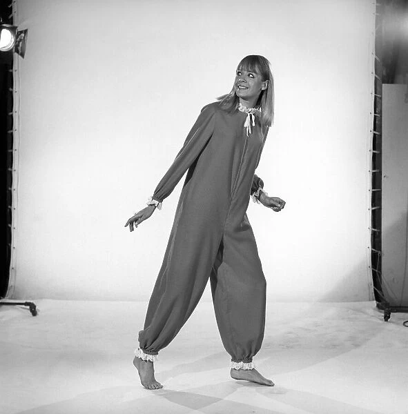 Model Judy Weldon wearing clown pyjama suit. 1965 B2191-003