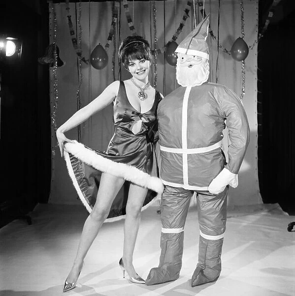 Model Kim Tracy seen here dressed for the office Christmas Party. 1960 E479-010