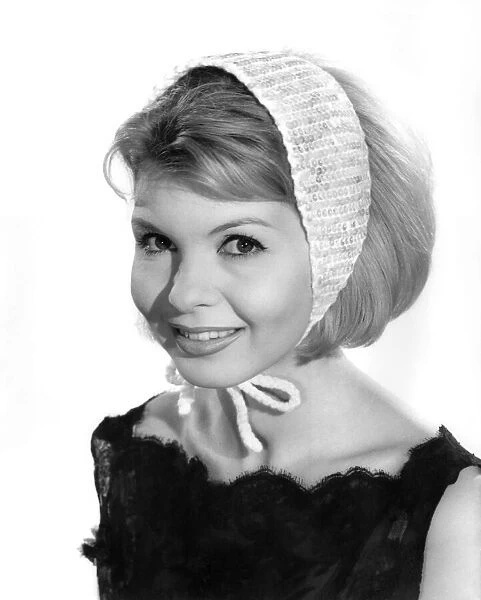 Model Liz Duke wearing a headscarf. December 1962 P008882