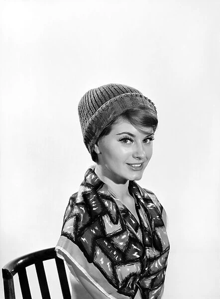 Model Margaret Lorraine wearing knitted cap. 1960