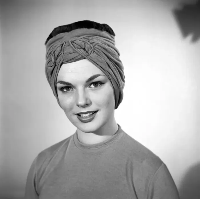 Framed Print : Model Mary Dixon wearing a hat that can be converted into a face mask. April 1956 Framed Print : Model Mary Dixon wearing a hat that can be converted into a face mask. April 1956