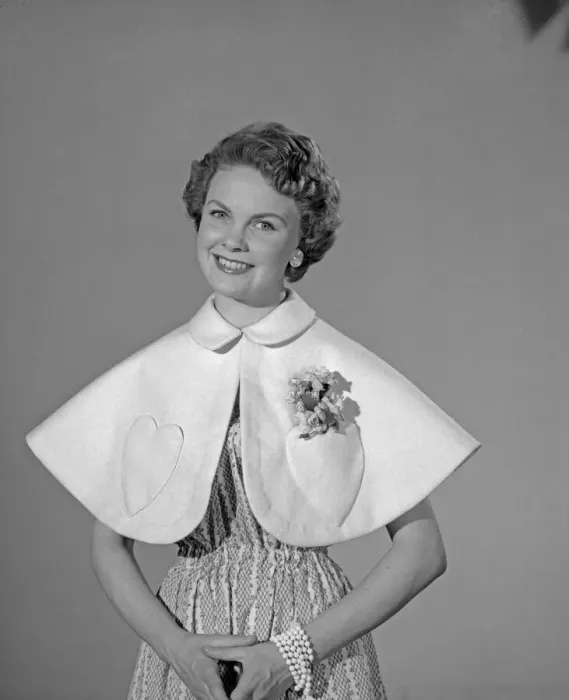 Framed Print : Model Maureen Denham seen here wearing a felt Cape made from a Reveille readers pattern Framed Print : Model Maureen Denham seen here wearing a felt Cape made from a Reveille readers pattern