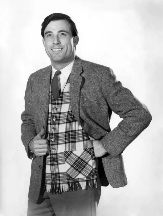 Framed Print : Model Peter Anthony wearing suit jacket over a tartan waistcoat Framed Print : Model Peter Anthony wearing suit jacket over a tartan waistcoat