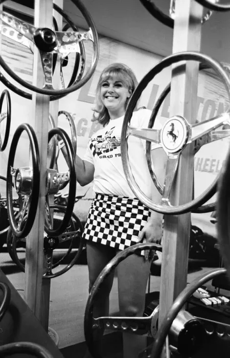 Framed Print : Model poses with steering wheels on a stand at the 1966 London Motor Show 18th October Framed Print : Model poses with steering wheels on a stand at the 1966 London Motor Show 18th October
