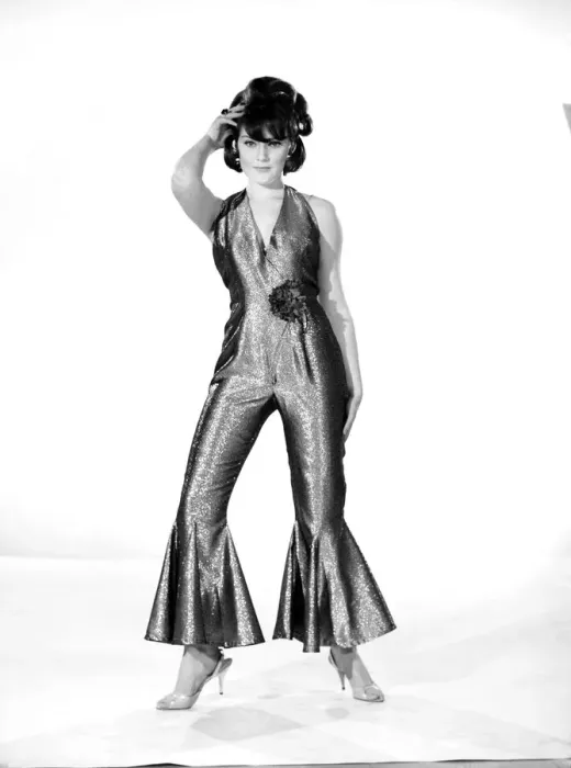 Framed Print : Model Rita Royce wearing lurex suit. Circa 1963