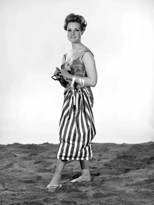 Framed Print : Model Roma Reeves wearing beach toga that doubles as a beach towel. May 1962 Framed Print : Model Roma Reeves wearing beach toga that doubles as a beach towel. May 1962