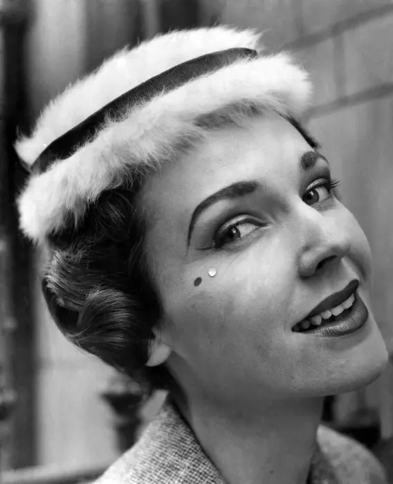 Framed Print : Model seen here wearing the latest millinery and beauty spots. July 1955 P010000 Framed Print : Model seen here wearing the latest millinery and beauty spots. July 1955 P010000
