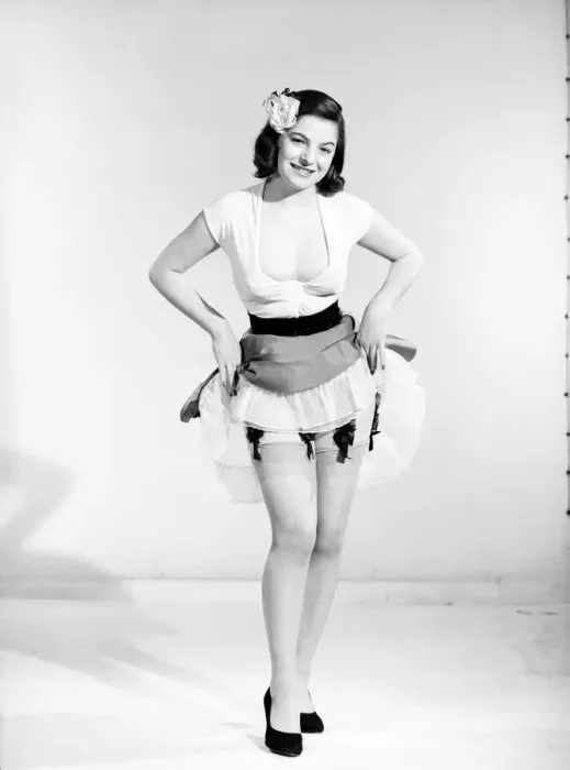 Framed Print : Model showing off tights and suspenders. 1966 Framed Print : Model showing off tights and suspenders. 1966