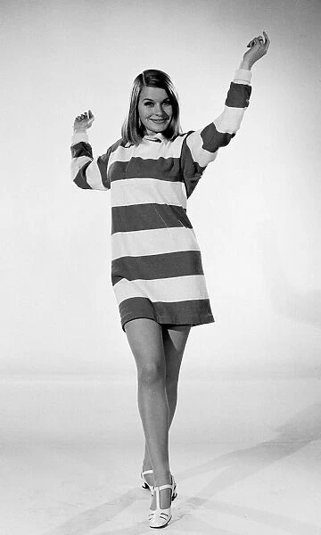 Model with striped jumper