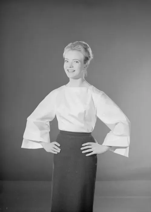Framed Print : Model Valerie Hollman wearing white blouse and dark skirt