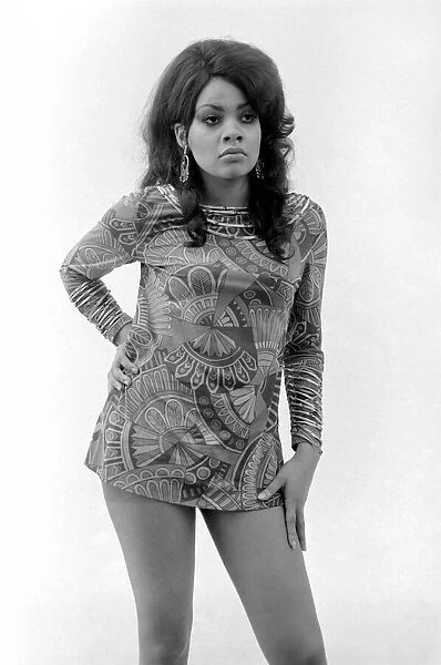 Model Vicki Richards wearing a patterned mini dress. October 1969 Z10451-003