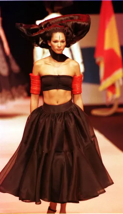 Framed Print : A model walking down the catwalk October 1997 showing Christian Lacroix latest designs in