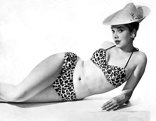 Model wearing a bikini and hat. May 1958 P018058