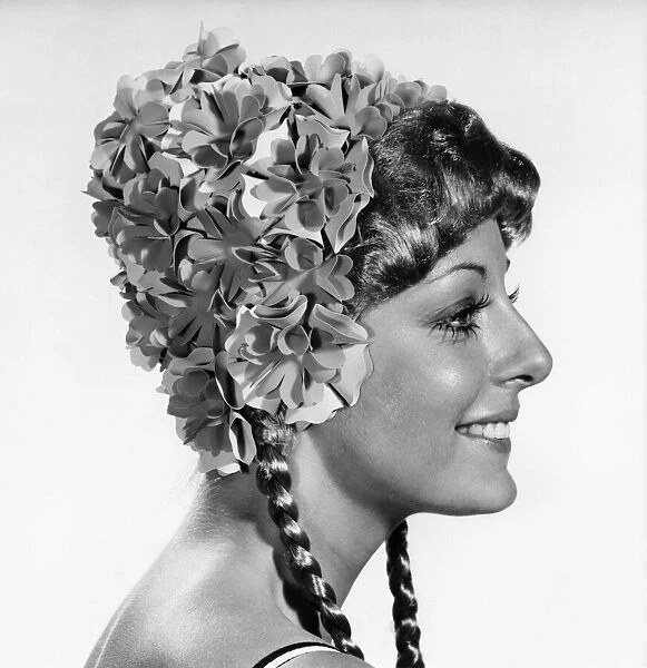 Model wearing a flowery swimcap. October 1970 P017300