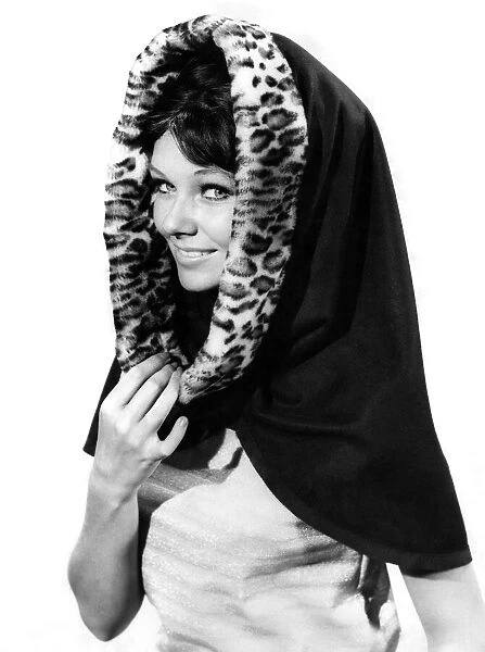 Model wearing a headscarf with leopard skin patterned lining