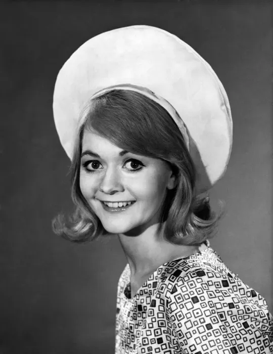 Framed Print : Model wearing large hat with patterned top August 1964 P007540 Framed Print : Model wearing large hat with patterned top August 1964 P007540