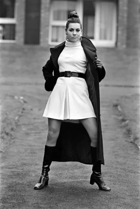 Framed Print : A model wearing the latest in fashions. April Royle wearing a midi (it doesn