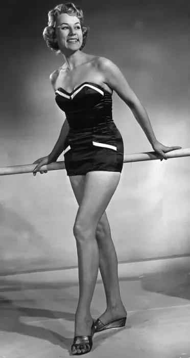 Framed Print : Model wearing latest swimsuit beachwear design 1955