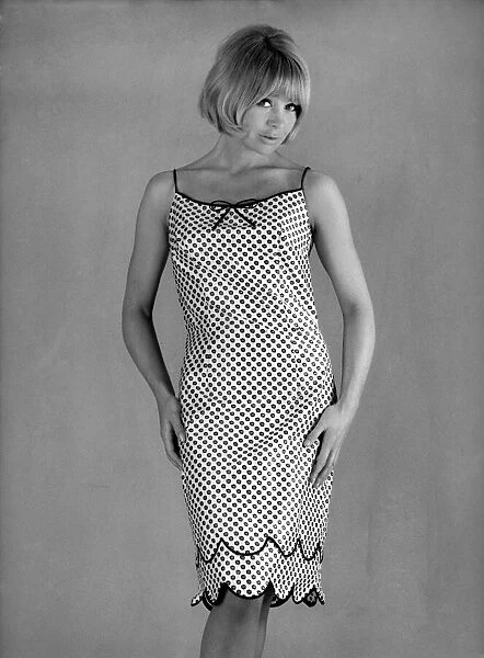 Model wearing a patterned dress June 1965