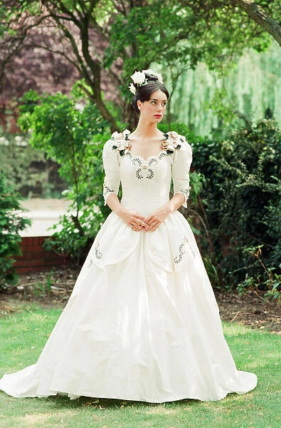 Model wearing Wedding Dress. Your Wedding Supplement